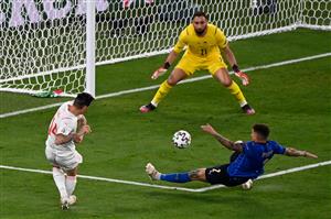 TOPSHOT - Switzerland's midfielder Steven Zuber (L) attempts on goal during the UEFA EURO 2020 Group A football match between Italy and Switzerland at the Olympic Stadium in Rome on June 16, 2021. (Getty Images)