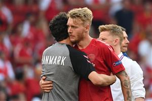 Denmark's defender Simon Kjaer reacts to their defeat after the UEFA EURO 2020 Group B football match between Denmark and Belgium at the Parken Stadium in Copenhagen on June 17, 2021. (Getty Images)