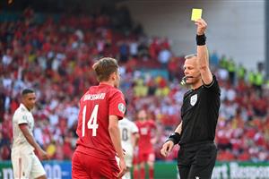 Denmark's forward Mikkel Damsgaard is shown a yellow card during the UEFA EURO 2020 Group B football match between Denmark and Belgium at the Parken Stadium in Copenhagen on June 17, 2021. (Getty Images)