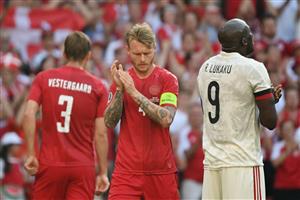 Denmark's defender Simon Kjaer (C) and Belgium's forward Romelu Lukaku (R) clap after the ball was kicked out of play in honour of Denmark's midfielder Christian Eriksen during the UEFA EURO 2020 Group B football match between Denmark and Belgium at the Parken Stadium in Copenhagen on June 17, 2021. - Eriksen suffered a cardiac arrest during his country's Euro 2020 opener last weekend. (Getty Images)