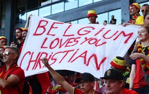 Belgium's supporters hold a banner in support of Denmark's midfielder Christian Eriksen before the start of the UEFA EURO 2020 Group B football match between Denmark and Belgium at the Parken Stadium in Copenhagen on June 17, 2021. (Getty Images)
