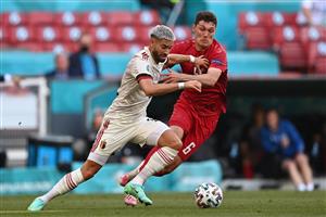 Belgium's midfielder Yannick Ferreira-Carrasco (L) and Denmark's defender Andreas Christensen vie for the ball during the UEFA EURO 2020 Group B football match between Denmark and Belgium at the Parken Stadium in Copenhagen on June 17, 2021. (Getty Images)