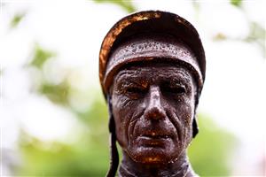 ASCOT, ENGLAND - JUNE 18: Detailed view of rain drops on the Lester Piggott statue on Day Four of the Royal Ascot Meeting at Ascot Racecourse on June 18, 2021 in Ascot, England. A total of twelve thousand racegoers made up of Owners and the Public are permitted to attend the meeting due to it being an Events Research Programme (ERP) set up by the government due to the Coronavirus Pandemic. (Photo by Harry Trump/Getty Images)