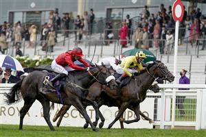 ASCOT, ENGLAND - JUNE 18: Clifford Lee riding Significantly (red) win The Palace Of Holyroodhouse Stakes on Day Four of the Royal Ascot Meeting at Ascot Racecourse on June 18, 2021 in Ascot, England. A total of twelve thousand racegoers made up of owners and the public are permitted to attend the meeting due to it being an Events Research Programme (ERP) set up by the Government due to the Coronavirus pandemic. (Photo by Alan Crowhurst/Getty Images)