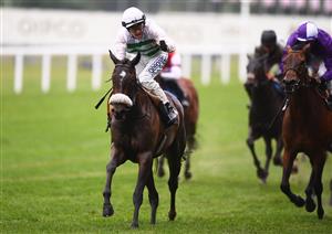 ASCOT, ENGLAND - JUNE 18: David Probert on board Sandrine on their way to winning the Albany Stakes on Day Four of the Royal Ascot Meeting at Ascot Racecourse on June 18, 2021 in Ascot, England. A total of twelve thousand racegoers made up of Owners and the Public are permitted to attend the meeting due to it being an Events Research Programme (ERP) set up by the government due to the Coronavirus Pandemic. (Photo by Harry Trump/Getty Images)