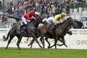 ASCOT, ENGLAND - JUNE 18: Clifford Lee riding Significantly (red) win The Palace Of Holyroodhouse Stakes on Day Four of the Royal Ascot Meeting at Ascot Racecourse on June 18, 2021 in Ascot, England. A total of twelve thousand racegoers made up of owners and the public are permitted to attend the meeting due to it being an Events Research Programme (ERP) set up by the Government due to the Coronavirus pandemic. (Photo by Alan Crowhurst/Getty Images)