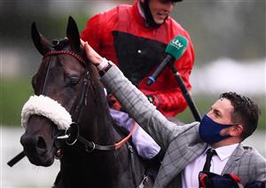 ASCOT, ENGLAND - JUNE 18: Clifford Lee celebrates on board Significantly with the groom after winning the Palace Of Holyroodhouse Stakes on Day Four of the Royal Ascot Meeting at Ascot Racecourse on June 18, 2021 in Ascot, England. A total of twelve thousand racegoers made up of Owners and the Public are permitted to attend the meeting due to it being an Events Research Programme (ERP) set up by the government due to the Coronavirus Pandemic. (Photo by Harry Trump/Getty Images)