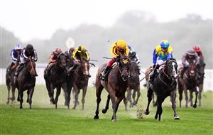 ASCOT, ENGLAND - JUNE 18: Oisin Murphy on board Dragon Symbol (R) on their way to winning the Commonwealth Cup which is later overturned on a stewards enquiry and awarded to Frankie Dettori on board Campanelle (L) on Day Four of the Royal Ascot Meeting at Ascot Racecourse on June 18, 2021 in Ascot, England. A total of twelve thousand racegoers made up of Owners and the Public are permitted to attend the meeting due to it being an Events Research Programme (ERP) set up by the government due to the Coronavirus Pandemic. (Photo by Harry Trump/Getty Images)