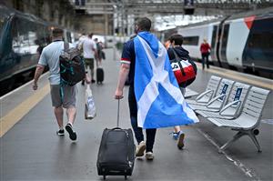 GLASGOW, SCOTLAND - JUNE 17: Scotland football supporters gather at Central Station before boarding trains to London on June 17, 2021 in Glasgow, Scotland. Officials in Scotland and London, where the match will be hosted at Wembley Stadium, have discouraged Scottish fans without tickets to the event of coming south, due to concerns about the spread of Covid-19. (Getty Images)