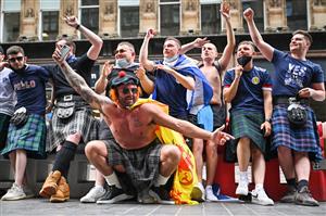 GLASGOW, SCOTLAND - JUNE 17: Scotland football supporters gather at Central Station before boarding trains to London on June 17, 2021 in Glasgow, Scotland. Officials in Scotland and London, where the match will be hosted at Wembley Stadium, have discouraged Scottish fans without tickets to the event of coming south, due to concerns about the spread of Covid-19. (Getty Images)