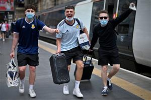 GLASGOW, SCOTLAND - JUNE 17: Scotland football supporters gather at Central Station before boarding trains to London on June 17, 2021 in Glasgow, Scotland. Officials in Scotland and London, where the match will be hosted at Wembley Stadium, have discouraged Scottish fans without tickets to the event of coming south, due to concerns about the spread of Covid-19. (Getty Images)