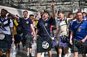 GLASGOW, SCOTLAND - JUNE 17: Scotland football supporters gather at Central Station before boarding trains to London on June 17, 2021 in Glasgow, Scotland. Officials in Scotland and London, where the match will be hosted at Wembley Stadium, have discouraged Scottish fans without tickets to the event of coming south, due to concerns about the spread of Covid-19. (Getty Images)
