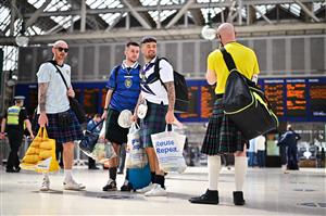 GLASGOW, SCOTLAND - JUNE 17: Scotland football supporters gather at Central Station before boarding trains to London on June 17, 2021 in Glasgow, Scotland. Officials in Scotland and London, where the match will be hosted at Wembley Stadium, have discouraged Scottish fans without tickets to the event of coming south, due to concerns about the spread of Covid-19. (Getty Images)