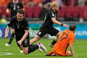 Austria's forward Michael Gregoritsch (L) and Netherlands' defender Daley Blind go down after a challange during the UEFA EURO 2020 Group C football match between the Netherlands and Austria at the Johan Cruyff Arena in Amsterdam on June 17, 2021. (Getty Images)