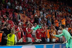 Austria's goalkeeper Daniel Bachmann throw's his shirt to fans after the UEFA EURO 2020 Group C football match between the Netherlands and Austria at the Johan Cruyff Arena in Amsterdam on June 17, 2021. (Getty Images)