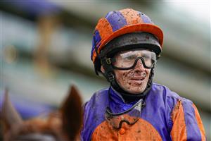 ASCOT, ENGLAND - JUNE 18: A muddy Ryan Moore returns after the first race of the day on Day Four of the Royal Ascot Meeting at Ascot Racecourse on June 18, 2021 in Ascot, England. A total of twelve thousand racegoers made up of owners and the public are permitted to attend the meeting due to it being an Events Research Programme (ERP) set up by the Government due to the Coronavirus pandemic. (Photo by Alan Crowhurst/Getty Images)