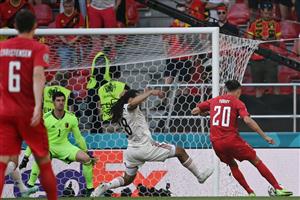 Denmark's forward Yussuf Poulsen (R) shoots to score the opening goal during the UEFA EURO 2020 Group B football match between Denmark and Belgium at the Parken Stadium in Copenhagen on June 17, 2021. (Getty Images)