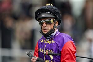 ASCOT, ENGLAND - JUNE 19: Frankie Dettori wearing Queen Elizabeth II silks on Day Five of the Royal Ascot Meeting at Ascot Racecourse on June 19, 2021 in Ascot, England. A total of twelve thousand racegoers made up of owners and the public are permitted to attend the meeting due to it being an Events Research Programme (ERP) set up by the Government due to the Coronavirus pandemic. (Photo by Alan Crowhurst/Getty Images)
