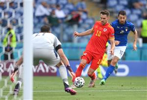 ROME, ITALY - JUNE 20: Aaron Ramsey of Wales runs with the ball during the UEFA Euro 2020 Championship Group A match between Italy and Wales at Olimpico Stadium on June 20, 2021 in Rome, Italy. (Getty Images)