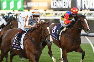 MELBOURNE, AUSTRALIA - JUNE 19: Fred Kersley riding Dice Roll winning Race 8, the Brian Beattie Handicap during Melbourne Racing at Flemington Racecourse on June 19, 2021 in Melbourne, Australia. (Photo by Vince Caligiuri/Getty Images)