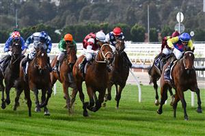 MELBOURNE, AUSTRALIA - JUNE 19: Craig Newitt riding Celestial Fury winning Race 1, the Rod Johnson Handicap during Melbourne Racing at Flemington Racecourse on June 19, 2021 in Melbourne, Australia. (Photo by Vince Caligiuri/Getty Images)