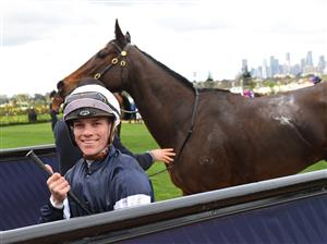 MELBOURNE, AUSTRALIA - JUNE 19: Will Price riding Degraves after winning race 5, the The David Bourke, during Melbourne Racing at Flemington Racecourse on June 19, 2021 in Melbourne, Australia. (Photo by Vince Caligiuri/Getty Images)
