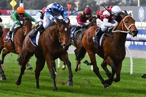 MELBOURNE, AUSTRALIA - JUNE 19: Craig Newitt riding Celestial Fury winning Race 1, the Rod Johnson Handicap during Melbourne Racing at Flemington Racecourse on June 19, 2021 in Melbourne, Australia. (Photo by Vince Caligiuri/Getty Images)