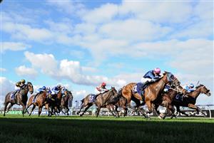 MELBOURNE, AUSTRALIA - JUNE 19: Matthew Cartwright riding Express Pass winning Race 3, the Murray Cox Handicap, during Melbourne Racing at Flemington Racecourse on June 19, 2021 in Melbourne, Australia. (Photo by Vince Caligiuri/Getty Images)