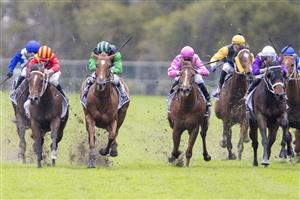 SYDNEY, AUSTRALIA - JUNE 19: Jason Collett (red)on Magic Ruler wins race 5 The Agency Real Estate Handicap during Sydney Racing at Rosehill Gardens on June 19, 2021 in Sydney, Australia. (Photo by Jenny Evans/Getty Images)