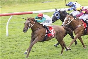 SYDNEY, AUSTRALIA - JUNE 19: Brenton Avdulla (red cap) on Wicklow wins race 2 the Sharp Extensive It Handicap during Sydney Racing at Rosehill Gardens on June 19, 2021 in Sydney, Australia. (Photo by Jenny Evans/Getty Images)
