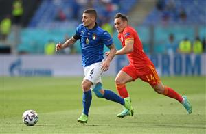 ROME, ITALY - JUNE 20: Marco Verratti of Italy runs with the ball whilst under pressure from Connor Roberts of Wales during the UEFA Euro 2020 Championship Group A match between Italy and Wales at Olimpico Stadium on June 20, 2021 in Rome, Italy. (Getty Images)