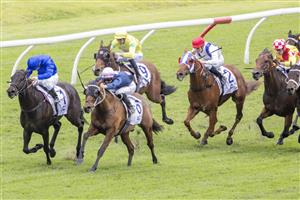 SYDNEY, AUSTRALIA - JUNE 19: James McDonald (pink cap) on No Compromise wins race 4 the Acy Securities Handicap during Sydney Racing at Rosehill Gardens on June 19, 2021 in Sydney, Australia. (Photo by Jenny Evans/Getty Images)