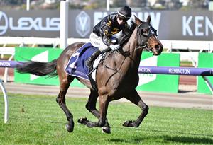 MELBOURNE, AUSTRALIA - JUNE 19: Jamie Kah riding South Pacific winning Race 2, the Adam Lindsay Gordon Handicap, during Melbourne Racing at Flemington Racecourse on June 19, 2021 in Melbourne, Australia. (Photo by Vince Caligiuri/Getty Images)