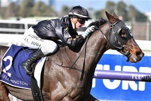 MELBOURNE, AUSTRALIA - JUNE 19: Jamie Kah riding South Pacific winning Race 2, the Adam Lindsay Gordon Handicap, during Melbourne Racing at Flemington Racecourse on June 19, 2021 in Melbourne, Australia. (Photo by Vince Caligiuri/Getty Images)