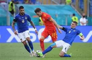 ROME, ITALY - JUNE 20: Aaron Ramsey of Wales is challenged by Marco Verratti of Italy during the UEFA Euro 2020 Championship Group A match between Italy and Wales at Olimpico Stadium on June 20, 2021 in Rome, Italy. (Getty Images)