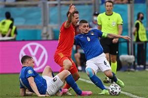 Italy's forward Andrea Belotti (L) and Italy's midfielder Marco Verratti (R) vie for the ball with Wales' midfielder Aaron Ramsey (C) during the UEFA EURO 2020 Group A football match between Italy and Wales at the Olympic Stadium in Rome on June 20, 2021. (Getty Images)