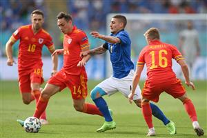 Wales' defender Connor Roberts (L) is marked by Italy's midfielder Marco Verratti (C) during the UEFA EURO 2020 Group A football match between Italy and Wales at the Olympic Stadium in Rome on June 20, 2021. (Getty Images)