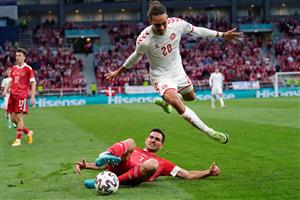 Russia's midfielder Magomed Ozdoev (L) fights for the ball with Denmark's forward Yussuf Poulsen during the UEFA EURO 2020 Group B football match between Russia and Denmark at Parken Stadium in Copenhagen on June 21, 2021. (Getty Images)