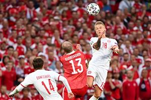 TOPSHOT - Denmark's defender Daniel Wass (R) heads the ball next to Russia's defender Fedor Kudryashov during the UEFA EURO 2020 Group B football match between Russia and Denmark at Parken Stadium in Copenhagen on June 21, 2021. (Getty Images)