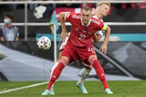 TOPSHOT - Russia's forward Artem Dzyuba (Front) fights for the ball with Denmark's defender Daniel Wass during the UEFA EURO 2020 Group B football match between Russia and Denmark at Parken Stadium in Copenhagen on June 21, 2021. (Getty Images)