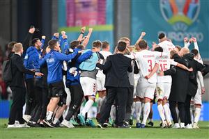 Denmark's players celebrate at the end of the UEFA EURO 2020 Group B football match between Russia and Denmark at Parken Stadium in Copenhagen on June 21, 2021. (Getty Images)