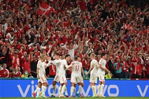 Denmark's players celebrate after scoring a goal during the UEFA EURO 2020 Group B football match between Russia and Denmark at Parken Stadium in Copenhagen on June 21, 2021. (Getty Images)