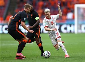 AMSTERDAM, NETHERLANDS - JUNE 21: Egzijan Alioski of North Macedonia is challenged by Georginio Wijnaldum and Matthijs de Ligt of Netherlands during the UEFA Euro 2020 Championship Group C match between North Macedonia and The Netherlands at Johan Cruijff Arena on June 21, 2021 in Amsterdam, Netherlands. (Getty Images)