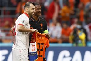 North Macedonia's forward Goran Pandev (L) and Netherlands' midfielder Georginio Wijnaldum pose before the UEFA EURO 2020 Group C football match between North Macedonia and the Netherlands at Johan Cruyff Arena in Amsterdam on June 21, 2021. (Getty Images)