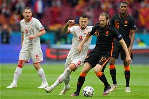 North Macedonia's forward Aleksandar Trajkovski (L) and Netherlands' defender Daley Blind vie for the ball during the UEFA EURO 2020 Group C football match between North Macedonia and the Netherlands at Johan Cruyff Arena in Amsterdam on June 21, 2021. (Getty Images)