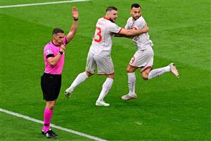 North Macedonia's defender Stefan Ristovski (C) and North Macedonia's forward Ivan Trickovski (R) celebrate an eventually disallowed goal during the UEFA EURO 2020 Group C football match between North Macedonia and the Netherlands at Johan Cruyff Arena in Amsterdam on June 21, 2021. (Getty Images)