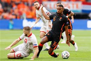 North Macedonia's defender Stefan Ristovski and Netherland's midfielder Ryan Gravenberch vie for the ball during the UEFA EURO 2020 Group C football match between North Macedonia and the Netherlands at Johan Cruyff Arena in Amsterdam on June 21, 2021. (Getty Images)