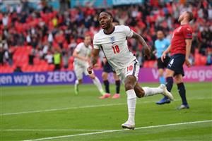 TOPSHOT - England's forward Raheem Sterling celebrates scoring the opening goal during the UEFA EURO 2020 Group D football match between Czech Republic and England at Wembley Stadium in London on June 22, 2021. (Getty Images)
