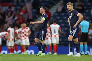 Scotland's defender Andrew Robertson (C) speaks with teammates after conceding a second goal during the UEFA EURO 2020 Group D football match between Croatia and Scotland at Hampden Park in Glasgow on June 22, 2021. (Getty Images)