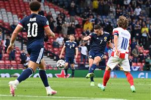 Scotland's midfielder John McGinn (C) attempts a shot during the UEFA EURO 2020 Group D football match between Croatia and Scotland at Hampden Park in Glasgow on June 22, 2021. (Getty Images)